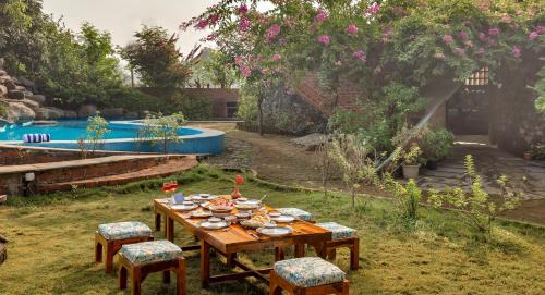 Vada Villa | SaffronStays Terracotta Trails - 2BR eco-luxury villa with earthy design, pool, open lawns & sustainable living in Wada