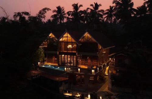 Candolim Villa | SaffronStays Tudor San Ann - 5BR Candolim villa with infinity pool, lift & sunrise-view rooms near beach