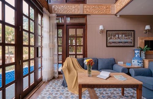 Candolim Villa | SaffronStays Tudor San Ann - 5BR Candolim villa with infinity pool, lift & sunrise-view rooms near beach