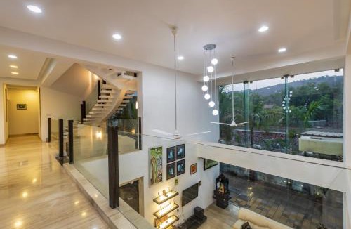 Tungarli Villa | SaffronStays Vedanta - 5BR luxury villa with plunge pool, game zone, lawn & Tungarli Lake nearby