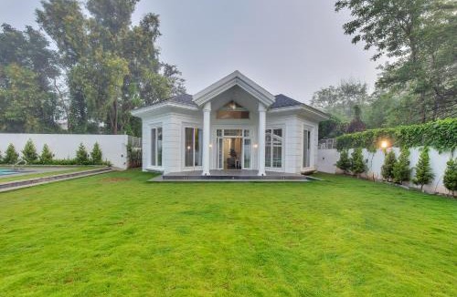 Jawhar Villa | SaffronStays White Pearl - 3BR Vikramgad villa, pool, gazebo, pergola, BBQ & bonfire, near Pinjal, Sajan & Kohoj
