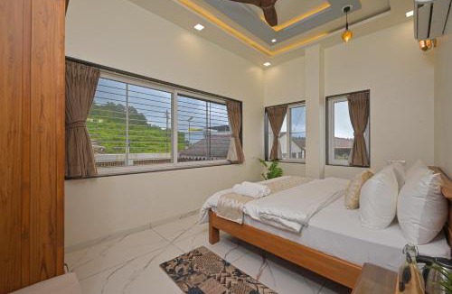 Igatpuri Villa | SaffronStays Zeel by the Lake - 4BR lakefront pool villa with gazebo, games room & stunning Bhavali Dam views