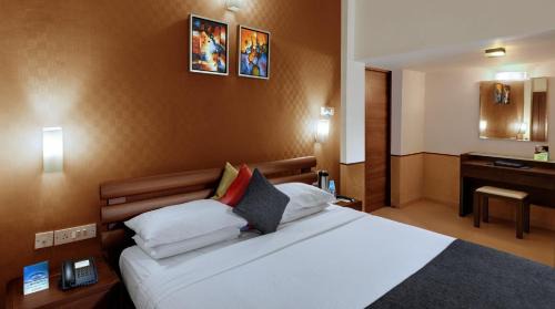 Vainguinim Hotel | Sandalwood Hotel & Suites