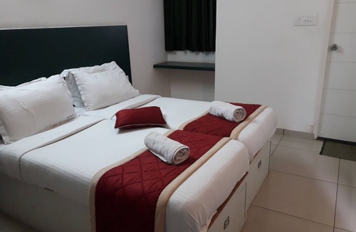 Electronic City Phase II Hotel | SAP Golden Grande