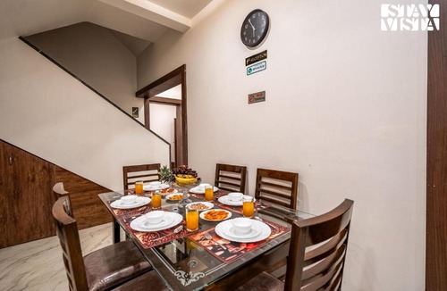 Nashik Apartment | Serenity Skies Apartment with Pool by VEO - Part of StayVista