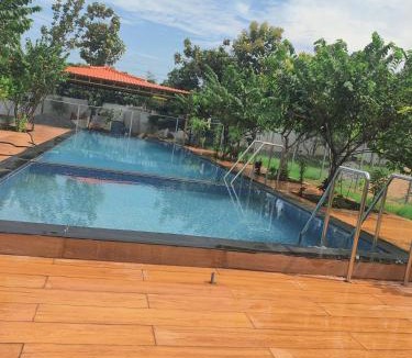 Bhimunipatnam House | Sivarama garden resort 8 AC living hall with 8 AC BHK stay &2 swimming pools& Box Cricket, settil and all near beach road, vishakhapatnam