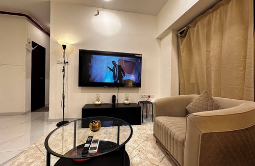 Jogeshwari West Apartment | Sky Oasis: Premium 2BHK I 65' TV, AC, High Floor, Andheri West