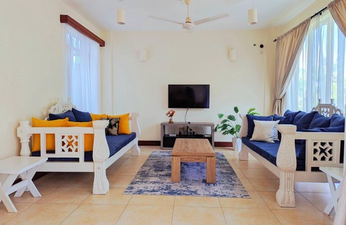 Bamburi Apartment | Spacious 2BR apartment with AC, WiFi and close to the beach access in Mombasa