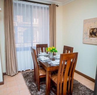 Msasani Peninsula Apartment | Spacious 2BR w pool & Gym