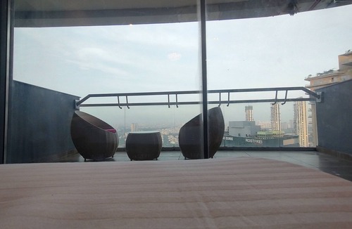 Noida Apartment | Spectacular 34th-Floor Studio with Skyline Views