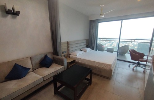 Noida Apartment | Spectacular 34th-Floor Studio with Skyline Views