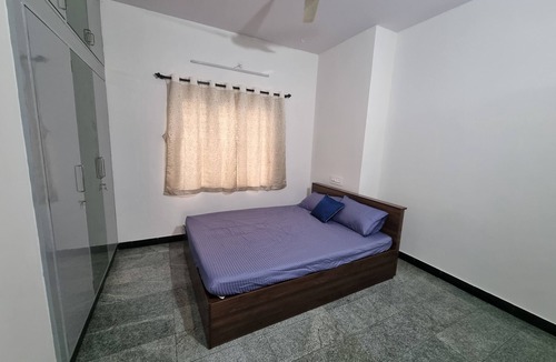 Sahakar Nagar House | Stay at your comfort of a home with basic cooking range and comfortable beds.