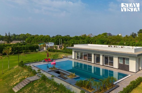 Taoru Villa | StayVista at Aarna Estate with Private Pool & Pickleball Court