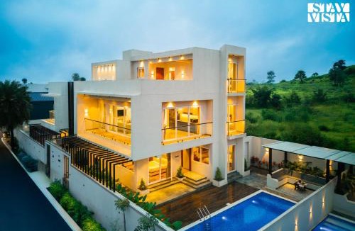Khodala Villa | StayVista at Amara Palms