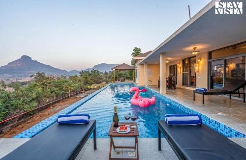 Javan Villa | StayVista at Beyond Infinity with Hill View, BBQ