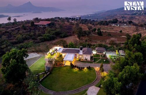 Javan Villa | StayVista at Beyond Infinity with Hill View, BBQ