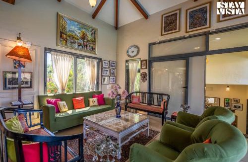 Javan Villa | StayVista at Beyond Infinity with Hill View, BBQ