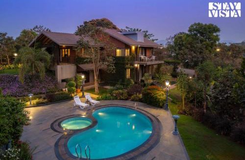 Nashik Villa | StayVista at Brickhouse Aranya with Pool and Farm View