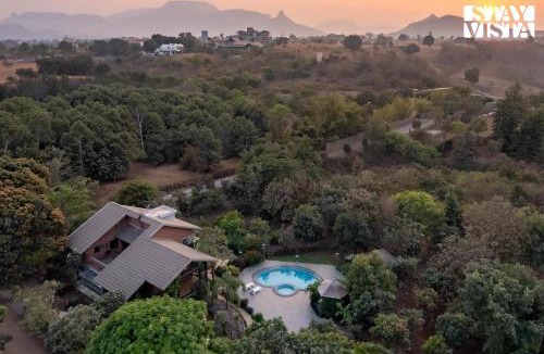 Nashik Villa | StayVista at Brickhouse Aranya with Pool and Farm View