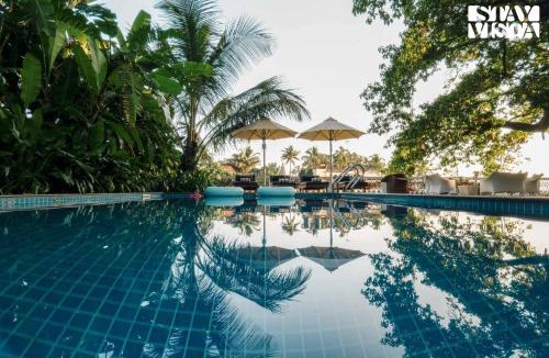 Baga Villa | StayVista at Di Mora by the Sea with Lawn & Pool