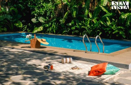 Baga Villa | StayVista at Di Mora by the Sea with Lawn & Pool
