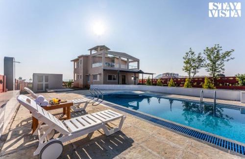 Medha Villa | StayVista at Golden Petal with BBQ & Bonfire