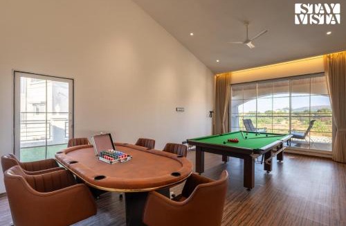 Kurvande Villa | StayVista at Meadows Land with Bonfire