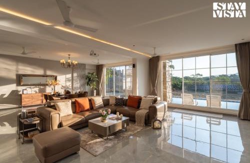 Kurvande Villa | StayVista at Meadows Land with Bonfire