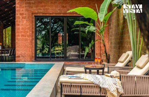 Moira Villa | StayVista at Moira by the River with Bonfire, BBQ