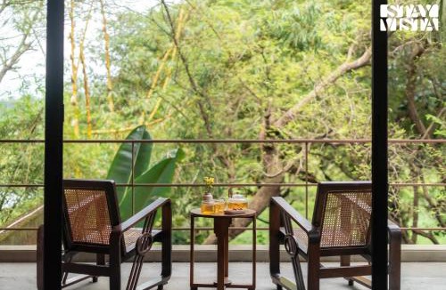 Moira Villa | StayVista at Moira by the River with Bonfire, BBQ