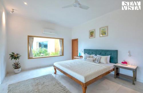Nathdwara Villa | StayVista at Nilaya In The Hills with Lake View, Pool