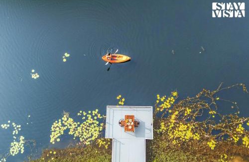 Virajpet House | StayVista at Nomad's Nook with Lawn, River View
