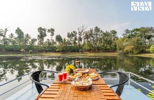 Virajpet House | StayVista at Nomad's Nook with Lawn, River View