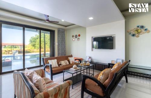 Anjanvel Villa | StayVista at Ocean Breeze with Bonfire & Pool