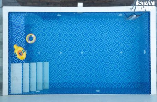 Khodala Villa | StayVista at Oriana Palms with Wifi and Pool