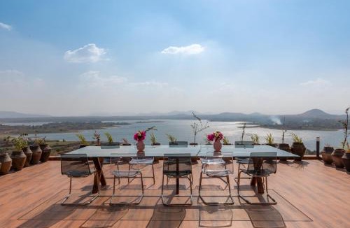 Igatpuri Villa | StayVista at Sunset on the Lake - Infinity Lakeview Swimming Pool with Contemporary Interiors & Lavish Amenities