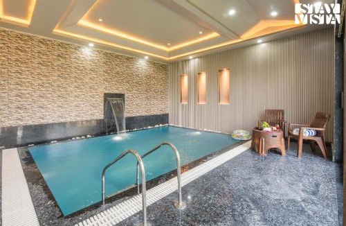 Jaipur Villa | StayVista at The Binclave with Jacuzzi, Pvt Indoor Pool, Bar & Projector