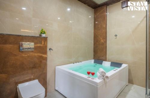 Jaipur Villa | StayVista at The Binclave with Jacuzzi, Pvt Indoor Pool, Bar & Projector