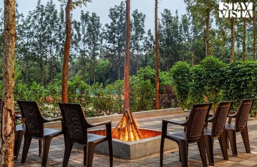 Mysore House | StayVista at The Boho Hideaway with Shared Pool, BBQ and Bonfire