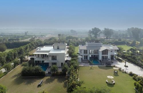 Gurugram Villa | StayVista at The Francolin Farm with Free Breakfast, Infinity Pool & Jacuzzi