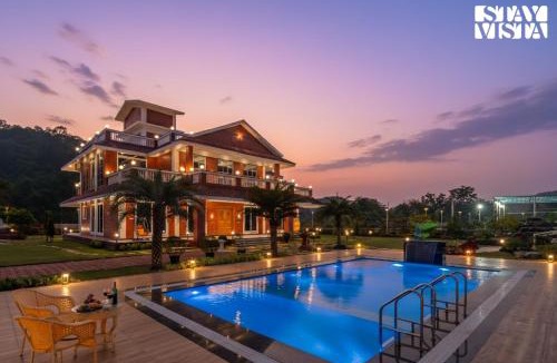 Roha Villa | StayVista at The Red Creek with BBQ and Bonfire
