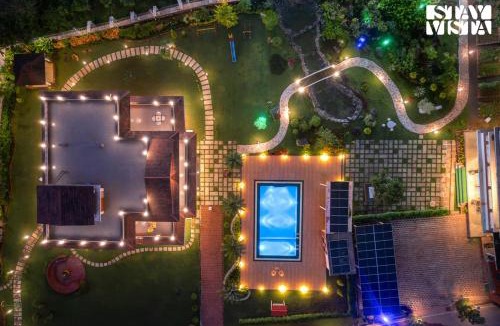 Roha Villa | StayVista at The Red Creek with BBQ and Bonfire