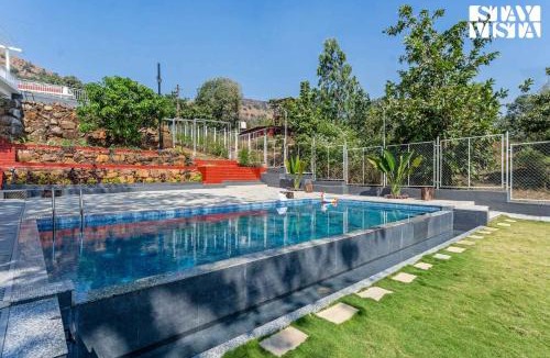 Panhala Villa | StayVista at The Redstone Villa with Bar, Lawn & Pool