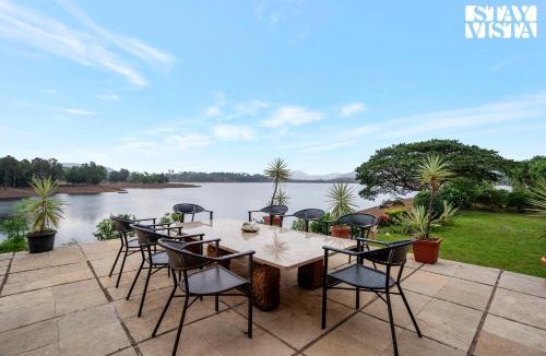 Wadgaon Villa | StayVista at Three Shores with Lake View & Alfresco Dining