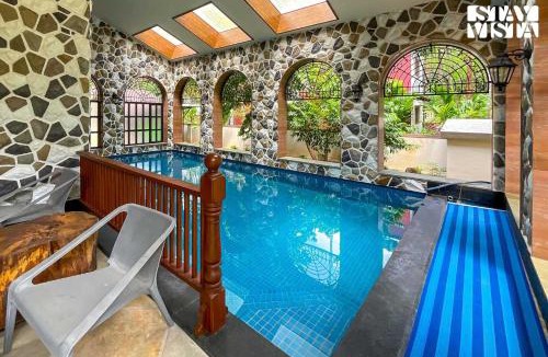 Alibaug Villa | StayVista at Villa Harmony with Bonfire, Pool