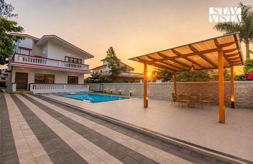 Kune N.m. Villa | StayVista's Brookvale Cottage - Dive into tranquility with pool view and gazebo