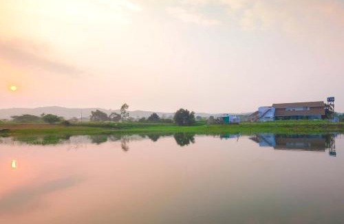 Nashik Villa | StayVista's Eva Villa - Lakeside Luxury with Modern Decor, Pool & Expansive Lawn - Near Sula