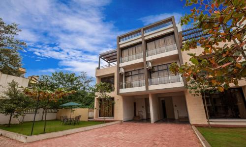 St.Stanislaus Villa Villa | StayVista's Greenwoods Villa 5 - City-Center Villa with Private Pool, Terrace, Lift & Music System