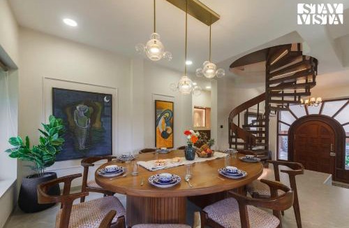 Parshwapuram Villa | StayVista's House Of J - Embrace Leisure with Lawn, Pool, and Gazebo