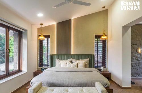 Parshwapuram Villa | StayVista's House Of J - Embrace Leisure with Lawn, Pool, and Gazebo